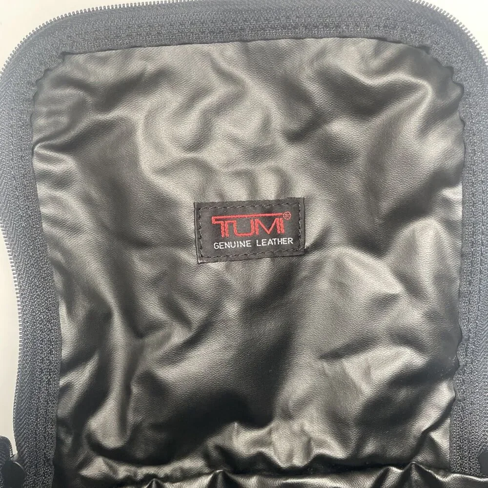 Tumi black leather